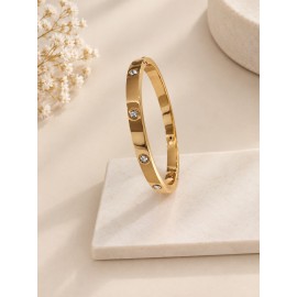 دستبند النگویی طلایی بیضی نگین دار برند accessories