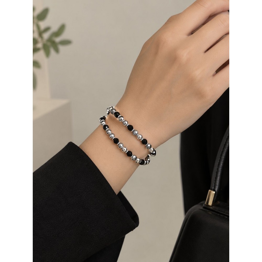 پک 2 عددی دستبند کشی مشکی نقره ای دخترانه برند accessories