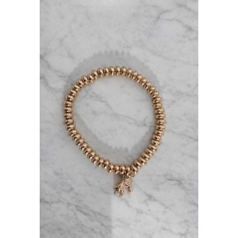 دستبند دخترانه مهره ای طلایی با آویز اسکیت