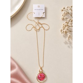 گردنبند زنانه طلایی بلند رنگ ثابت با پلاک دایره ای طرح گل برند accessories