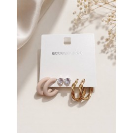 ست گوشواره سه جفتی نیم حلقه ای و میخی نگین دار برند accessories