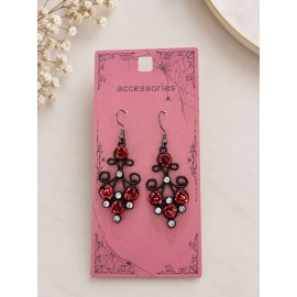 گوشواره آویز فانتزی زنانه مشکی با طرح گل رز و نگین برند accessories